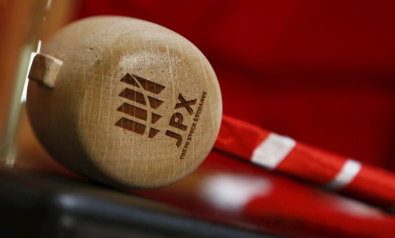 A logo of Japan Exchange Group Inc. is seen on a gavel before the New Year opening ceremony at the Tokyo Stock Exchange