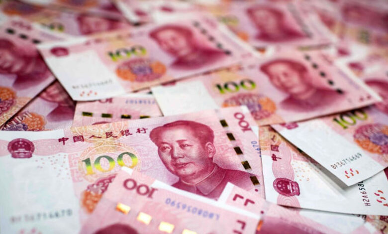 China's Yuan Falls to 6-Month Low as Central Bank Cuts Interest Rates
